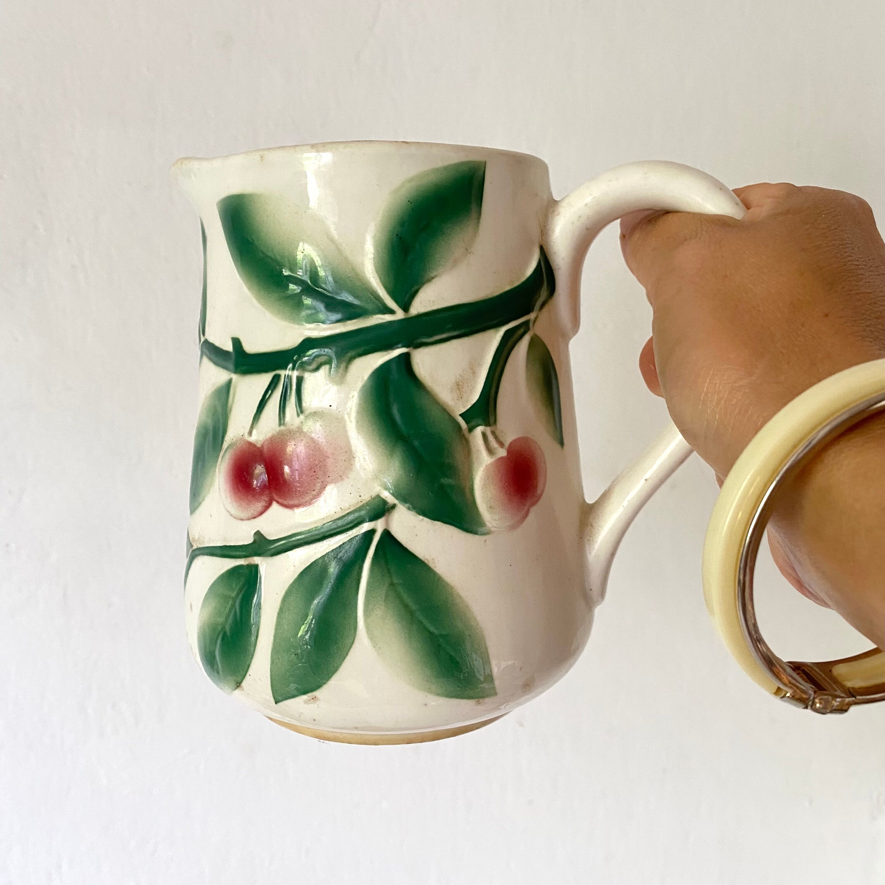 Antique pitcher in Digoin Cherry slip