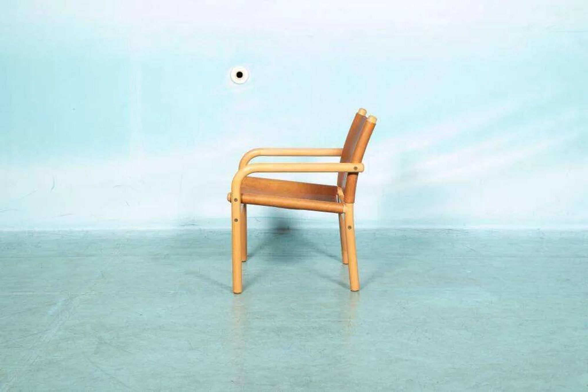 Danish safari chair in beech wood and leather from the 1970s.