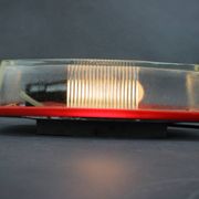 1970s Czech space age wall light with red plastic and glass.
