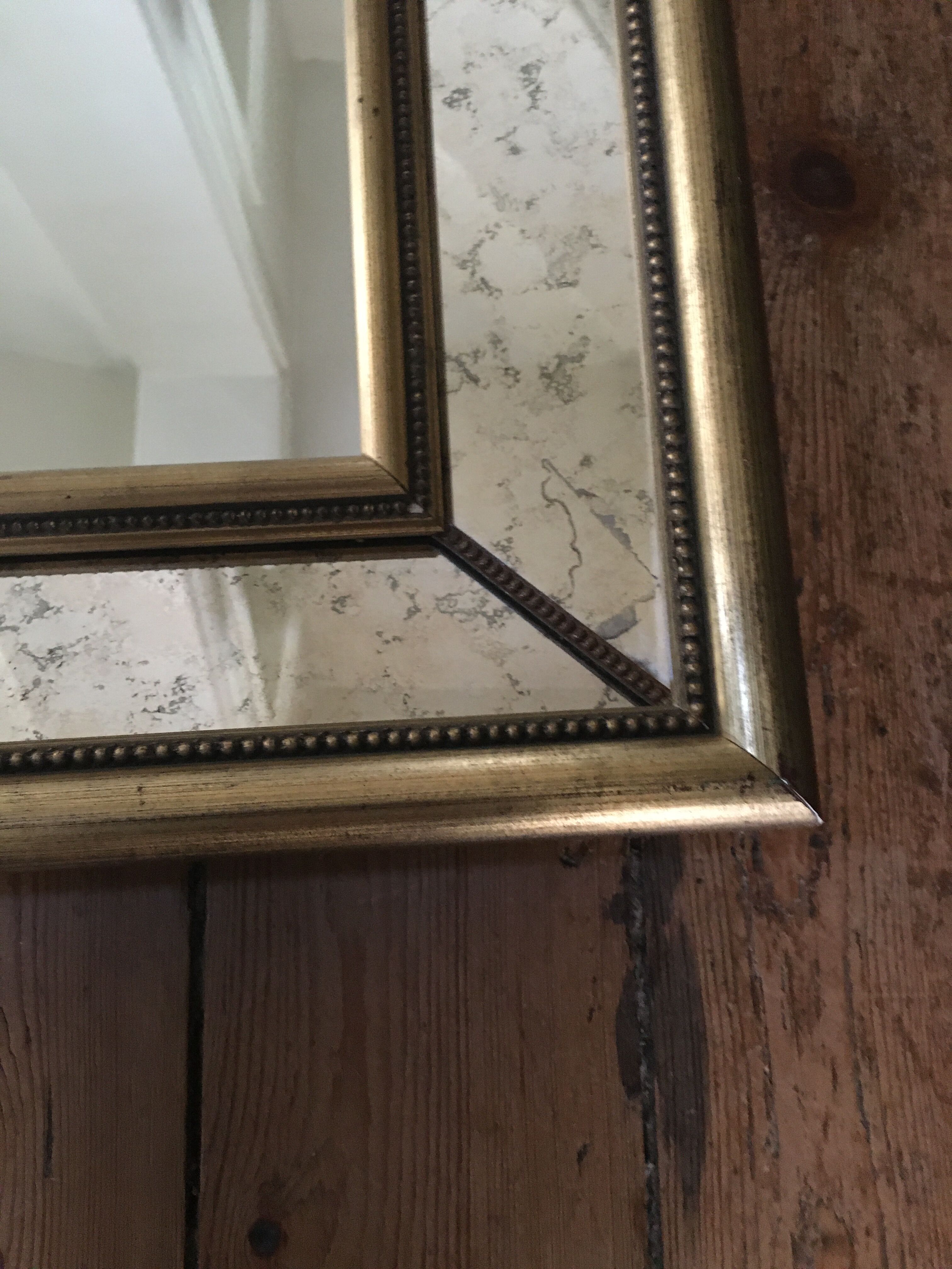 Golden mirror with 68 x 54 cm