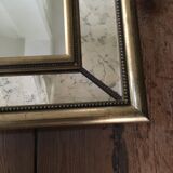 Golden mirror with 68 x 54 cm