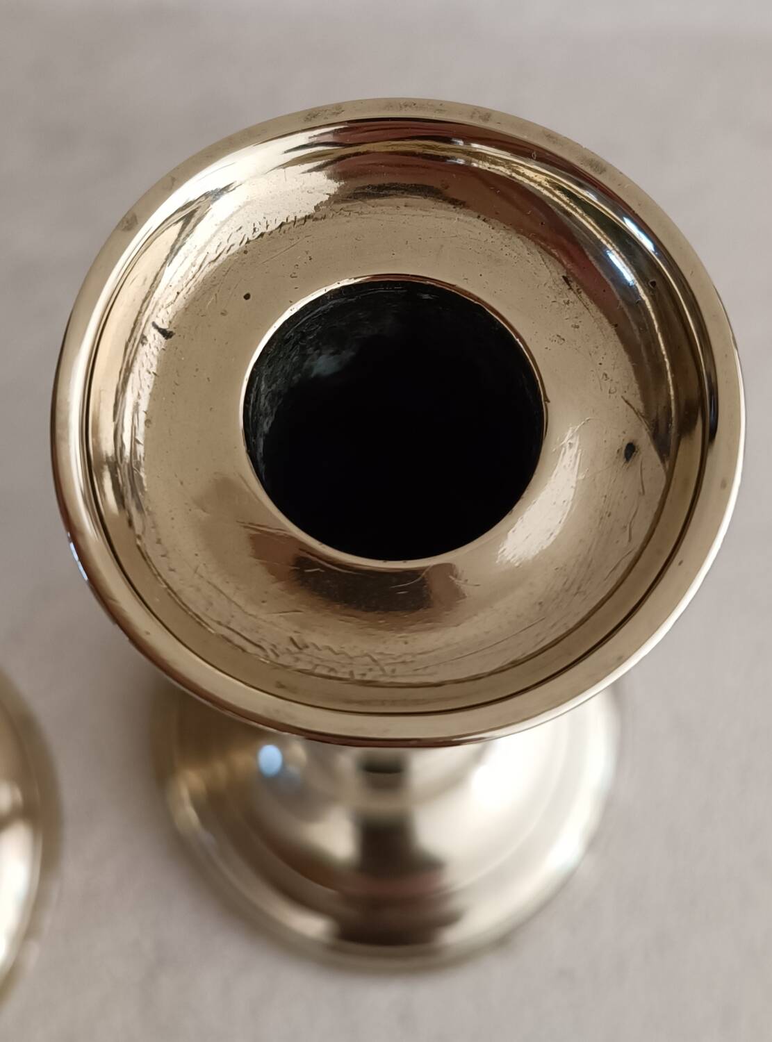 Pair of yellow copper candlesticks