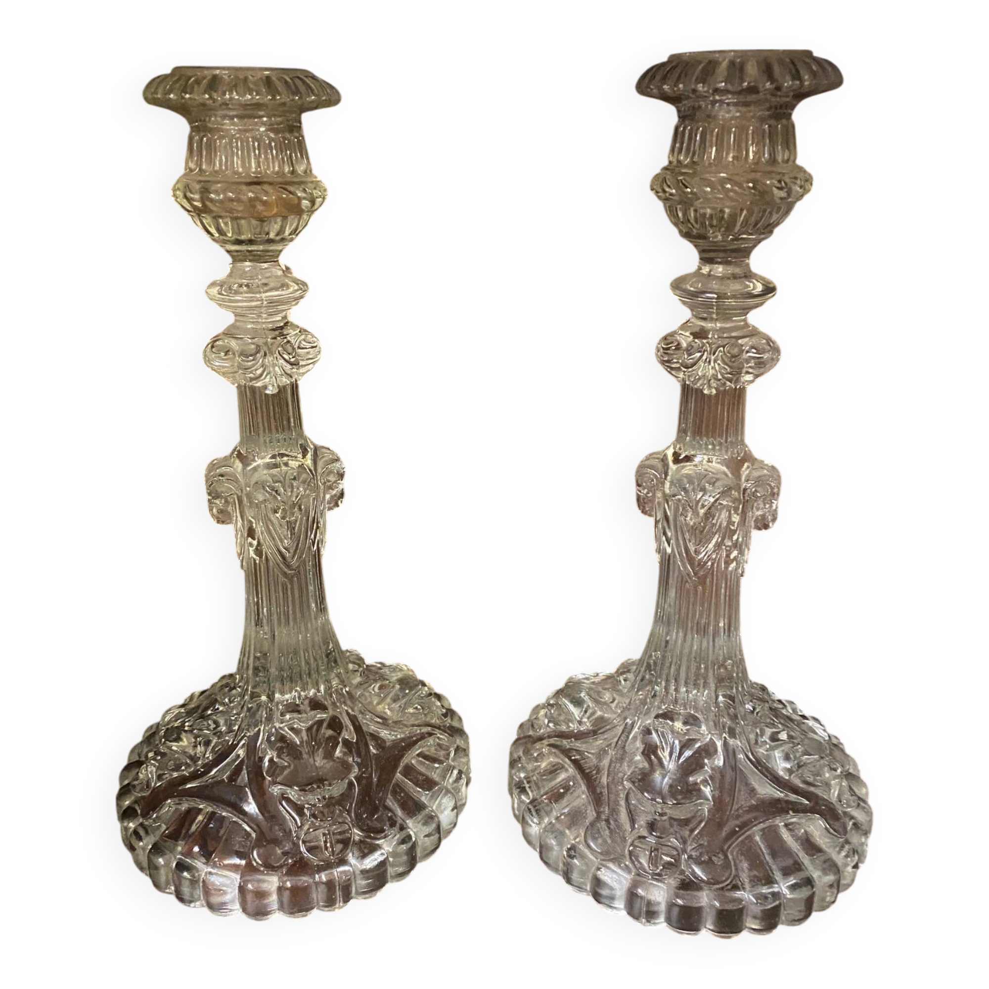 pair of cut glass candlesticks with lion and ram head decor, late 19th century