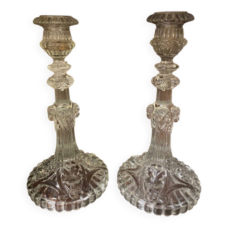 paire de bougeoirs en verre taille decor têtes de lions et beliers fin xix