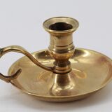 Old brass hand candle holder