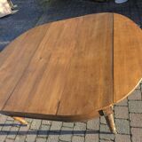 12-foot round oak table with 7 extensions / 20 people