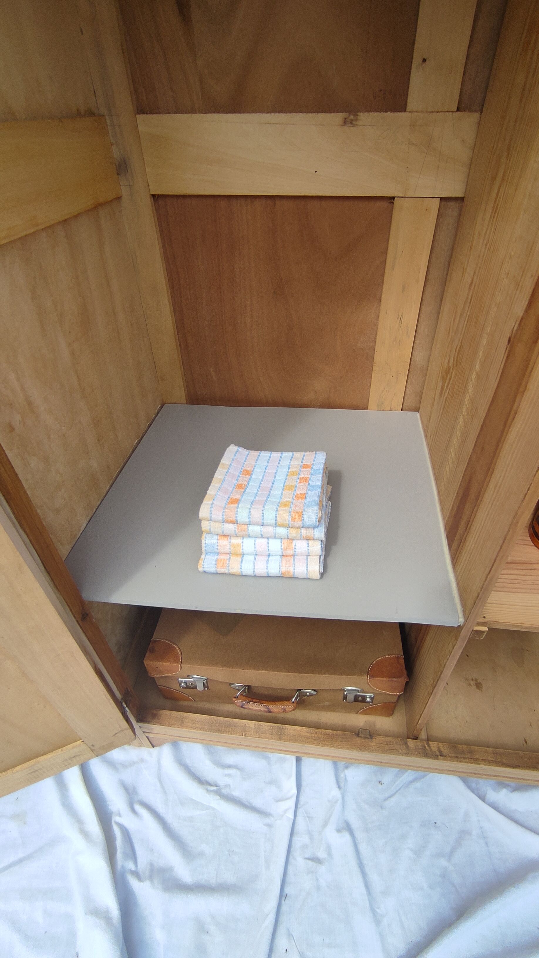 Parisian wardrobe in raw wood