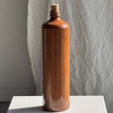 Large antique stoneware bottle with a small cork stopper