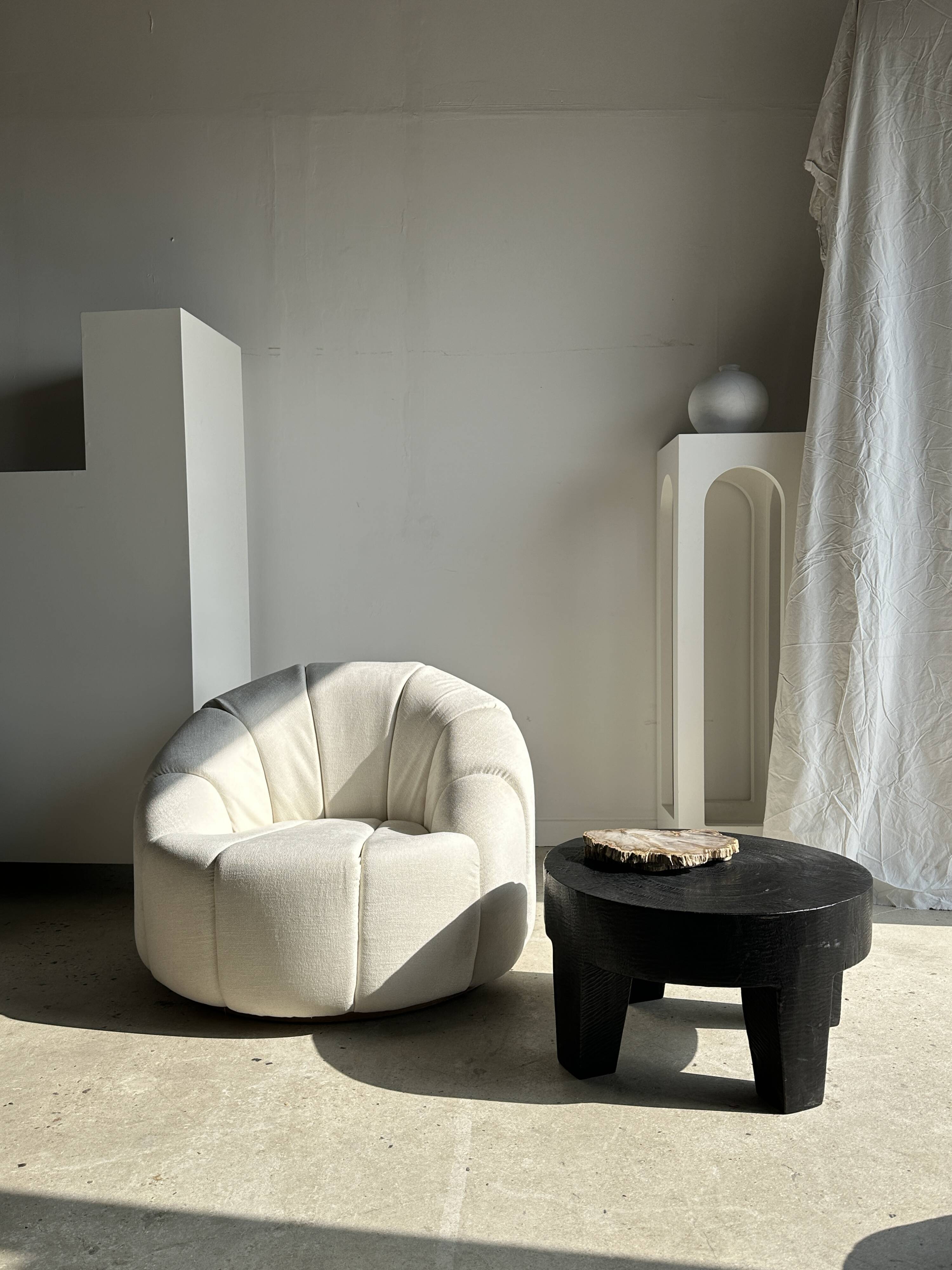 Large white circular armchair, white fabric upholstery