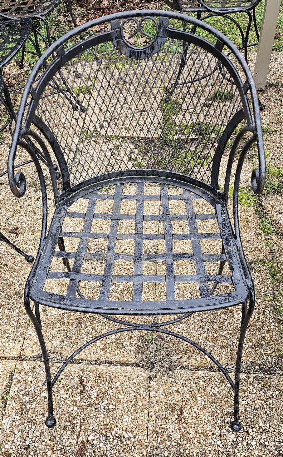 4 wrought iron garden chairs