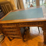 Solid wood desk and green leather writing pad