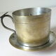Individual silver metal coffee maker