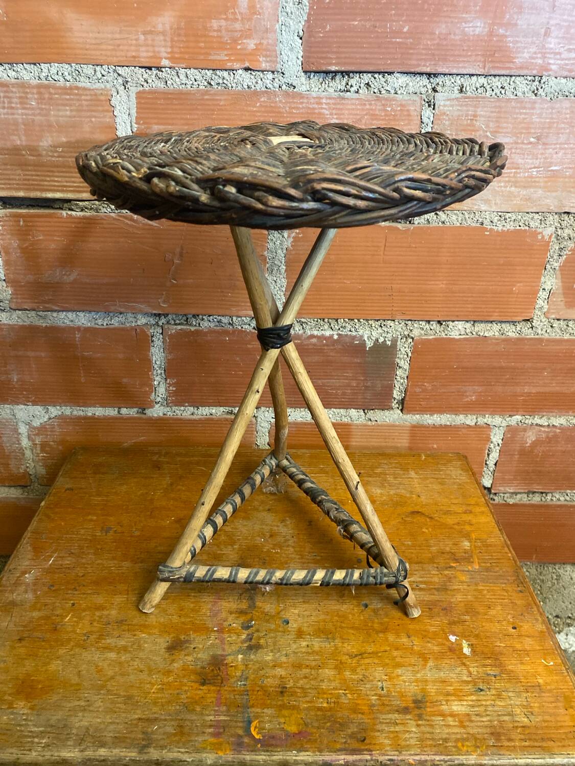 Vintage wooden tripod side table + woven wicker top