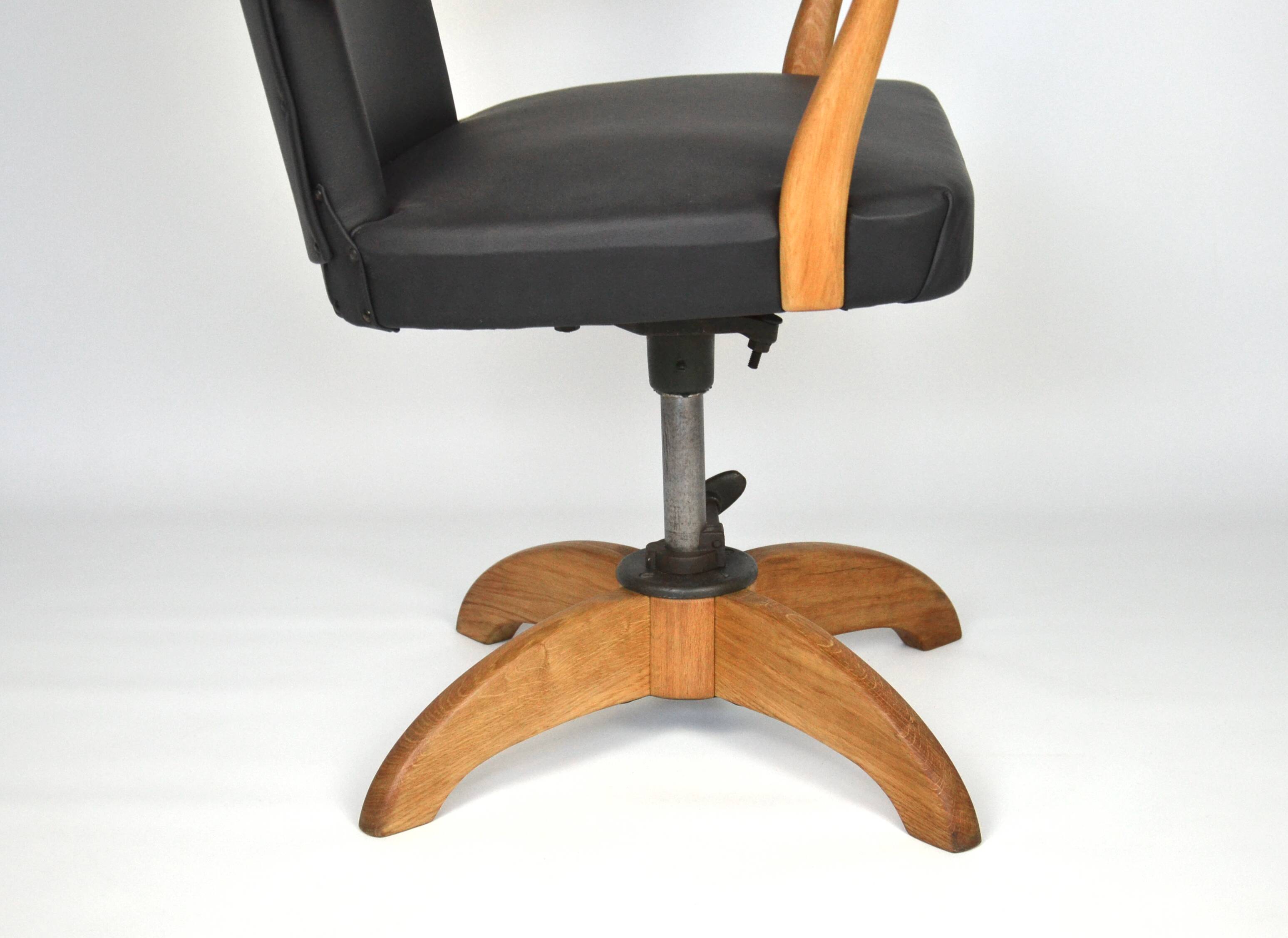 Antique black leather and oak desk chair 1900s, Sweden