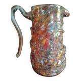 Multi-colored speckled glass pitcher