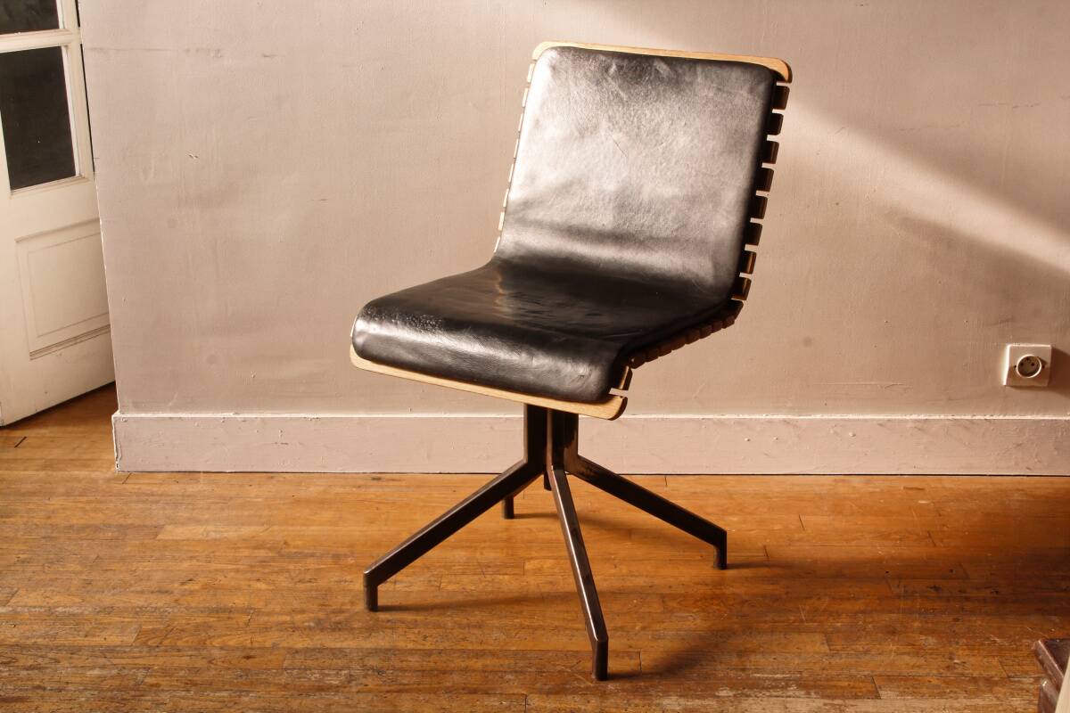 Handcrafted chair, laminated wood and leather