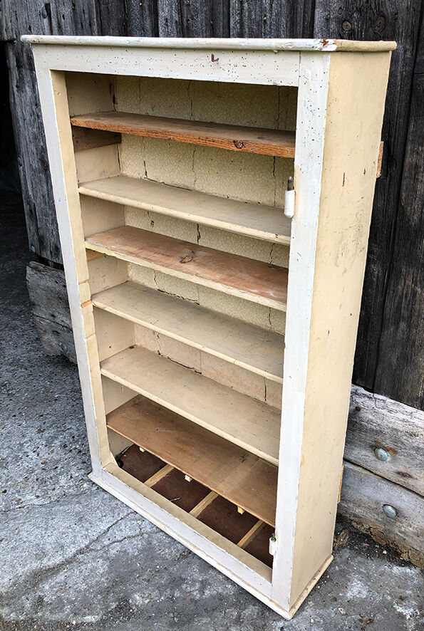 Old workshop wall showcase for screws and bolts
