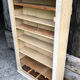 Old workshop wall showcase for screws and bolts