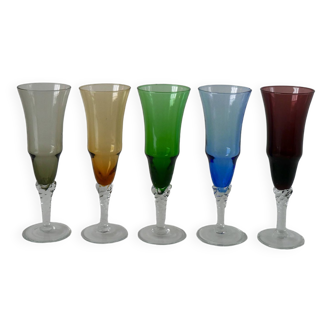 Lot of 5 colored champagne flutes with worked feet from the 60s and 70s