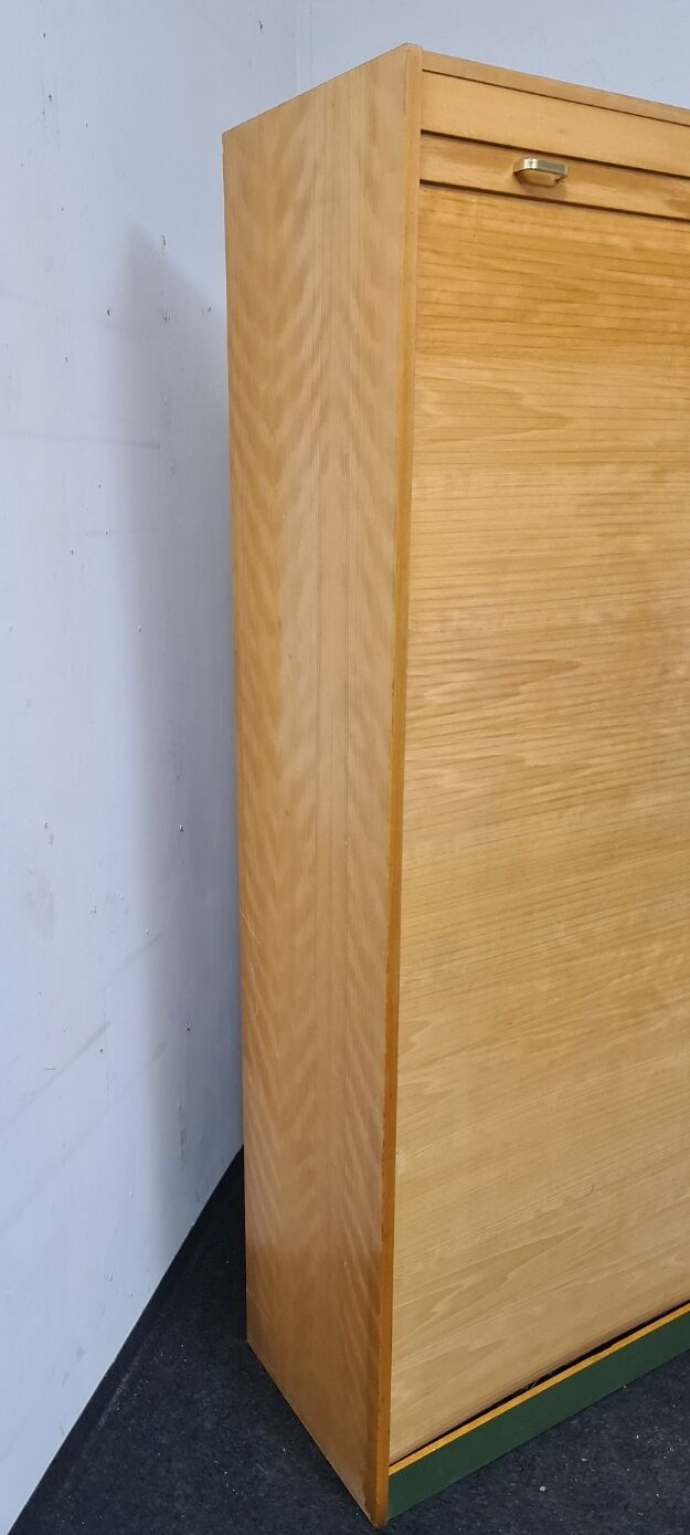 Vintage roll front cabinet by Wini