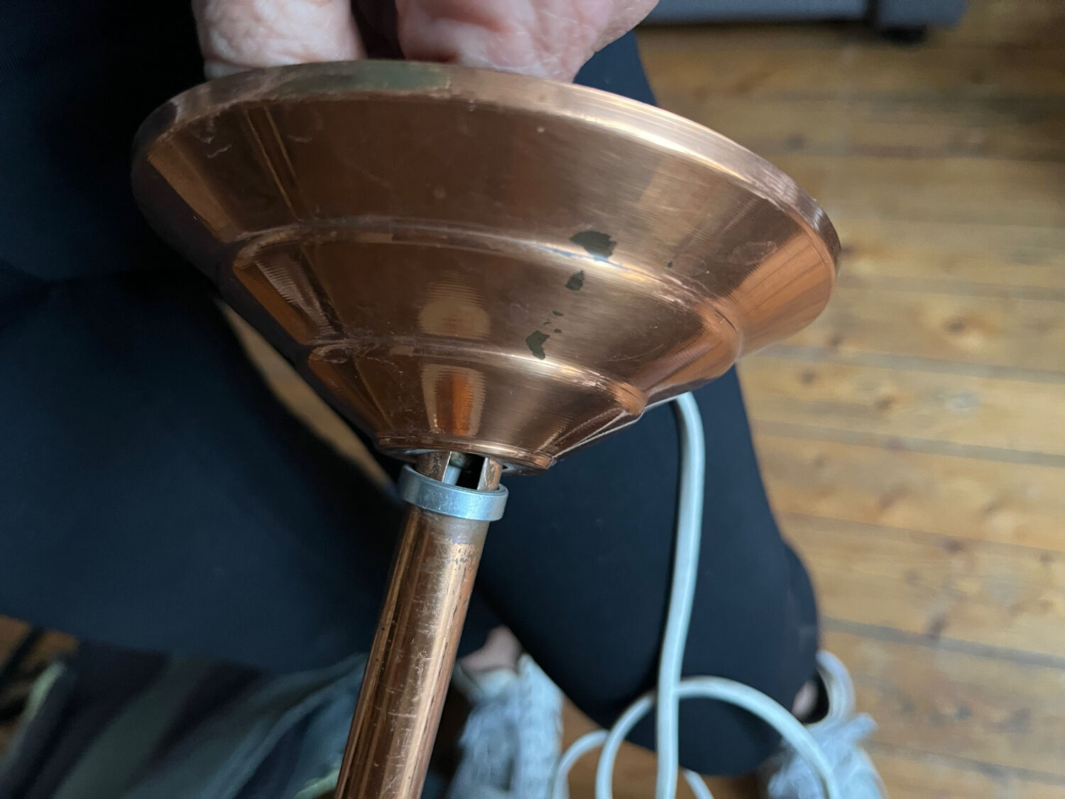 Opaline white globe pendant light with metal stem, Art Deco style.