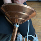 Opaline white globe pendant light with metal stem, Art Deco style.