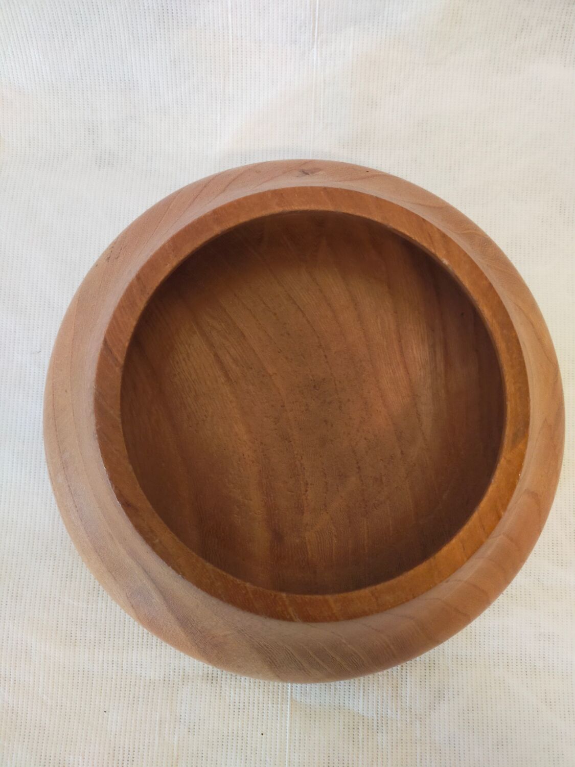 Empty turned wooden pocket