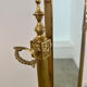 Old free-standing mirror in gilded brass in psychedelic neoclassical style Years 40 France