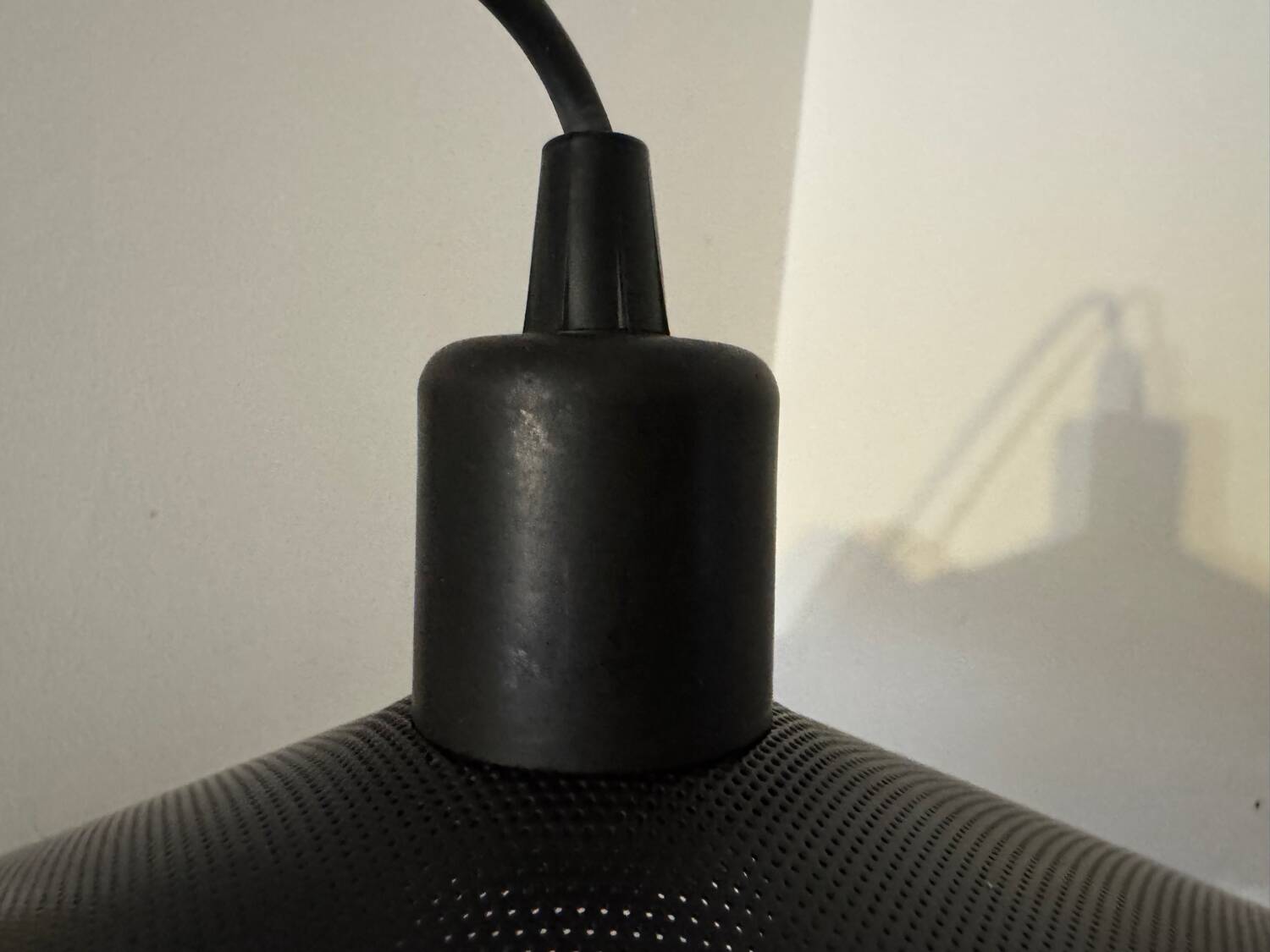 Metal micro-perforated suspension from the 1960s.