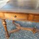 Old flat desk with brown leather top