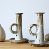 Duo of sandstone candlesticks