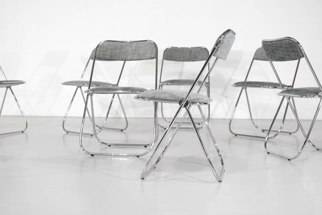 Set of 9 chrome folding chairs with fabric from the 1970s.