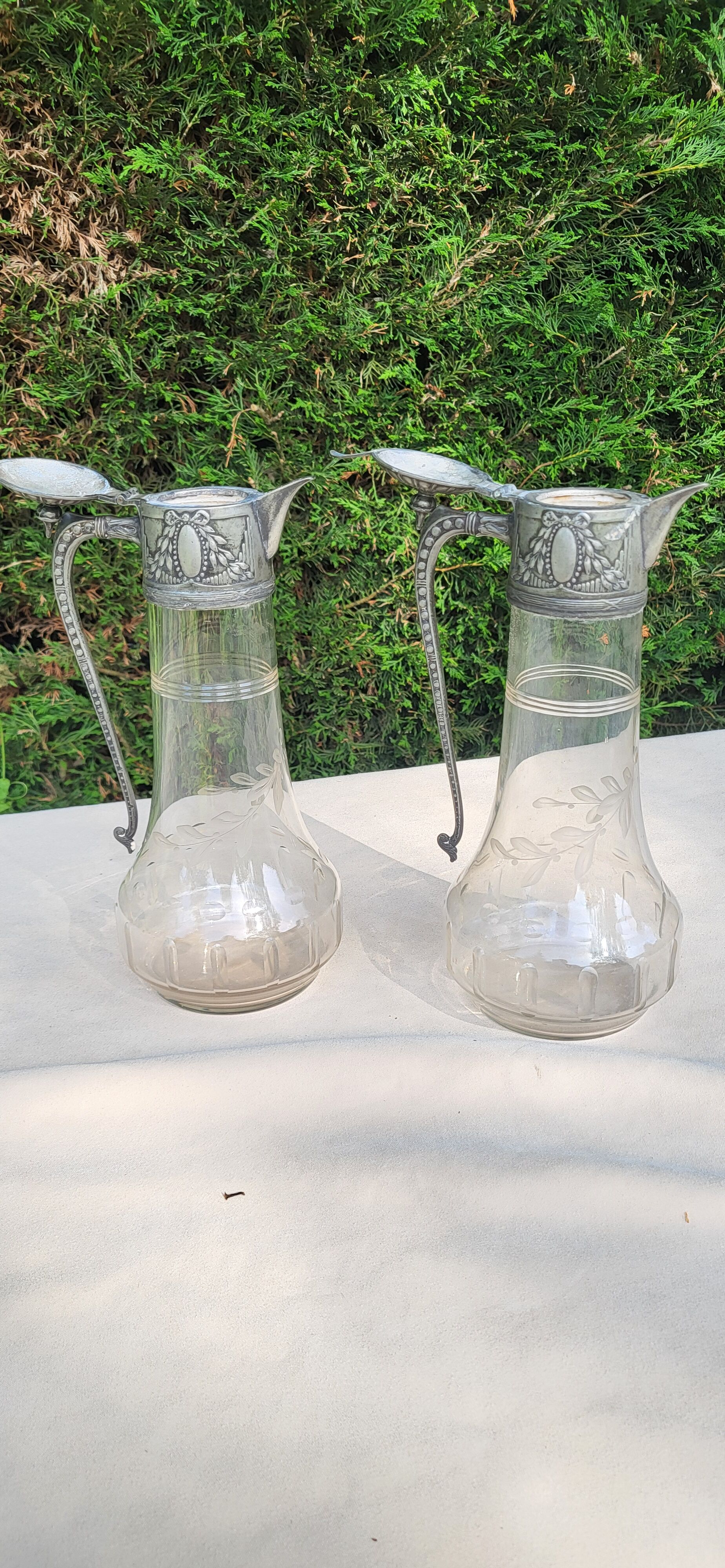 Pair of crystal and pewter jugs