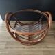 Grande table basse ronde vintage en rotin et verre fumé