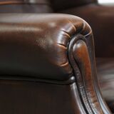 Very beautiful wing chair made of cowhide leather in English style