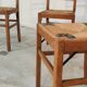 Set of 4 designer oak and straw chairs from the 1950s