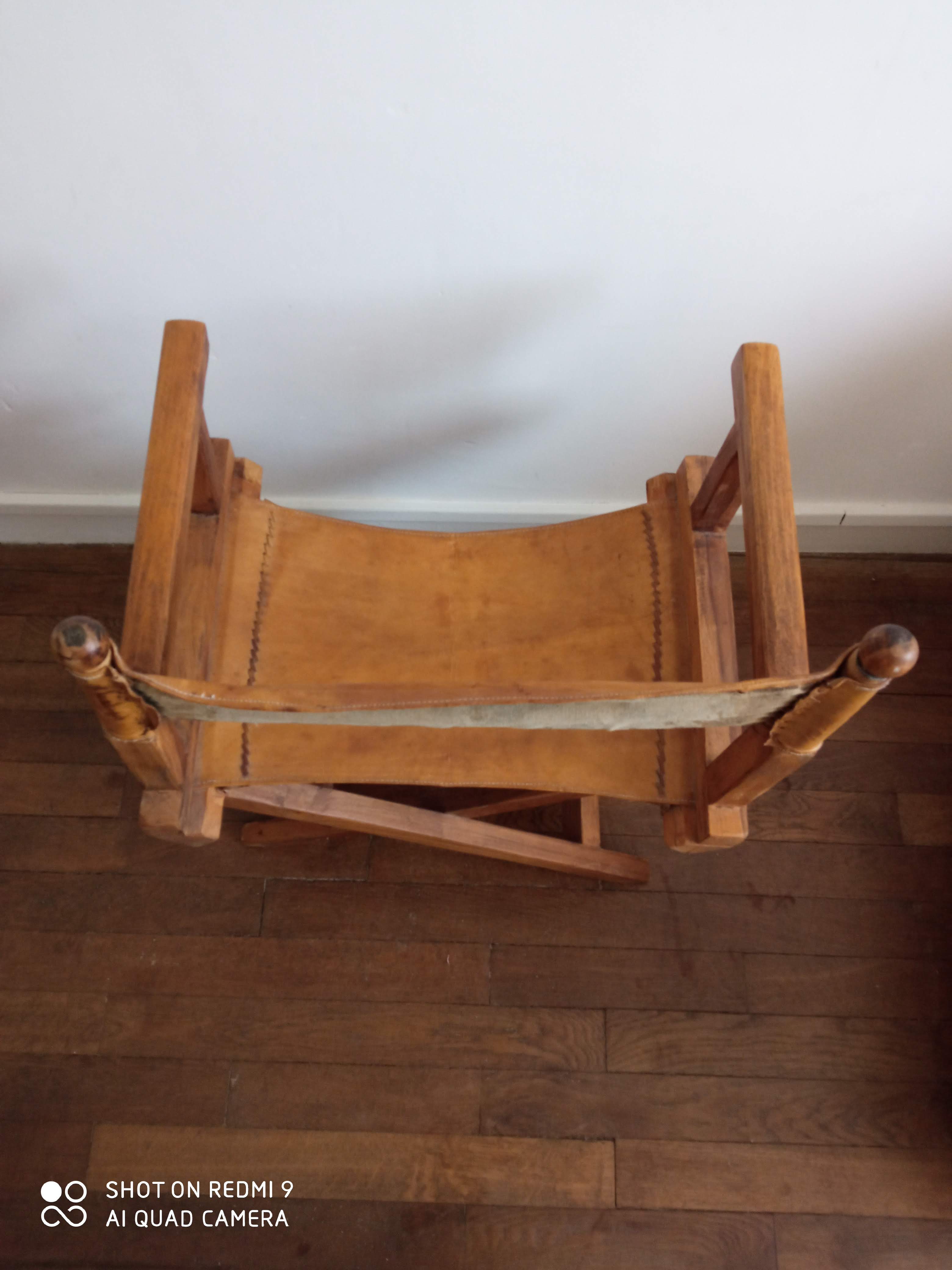 Old wood and leather safari chair