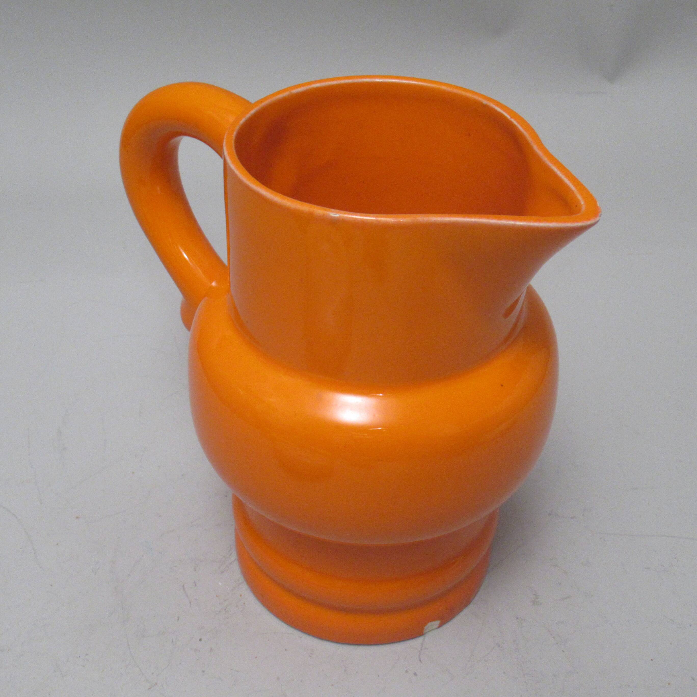 Pichet orange St Clément années 60