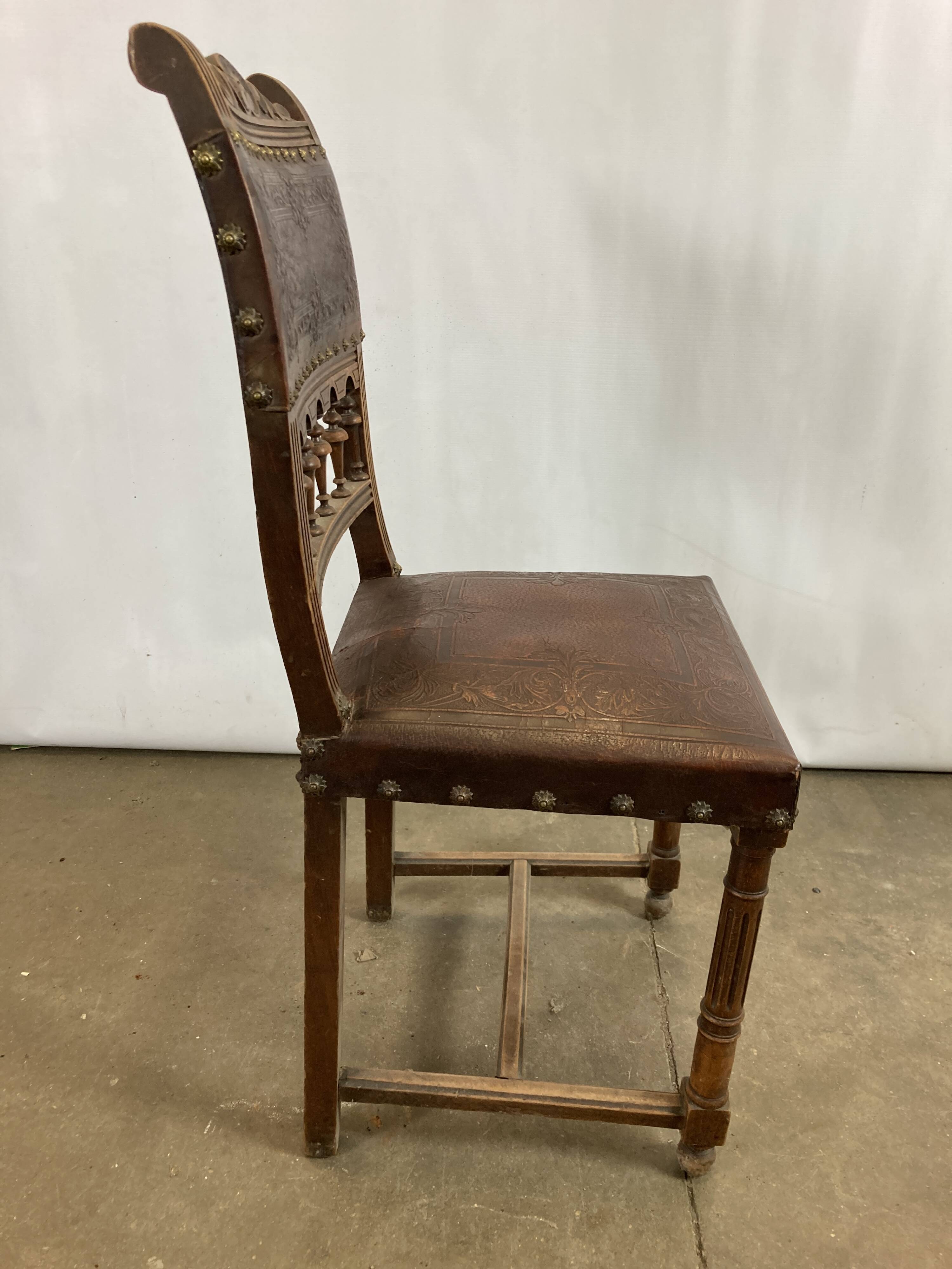 Pair of Henry II wooden and leather chairs