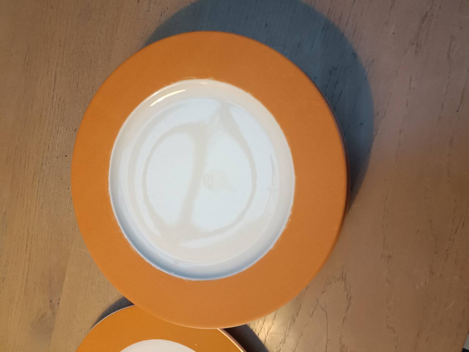 Orange Limoges porcelain plates