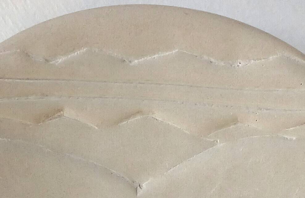 Plate "head with mask" natural stone hand carved