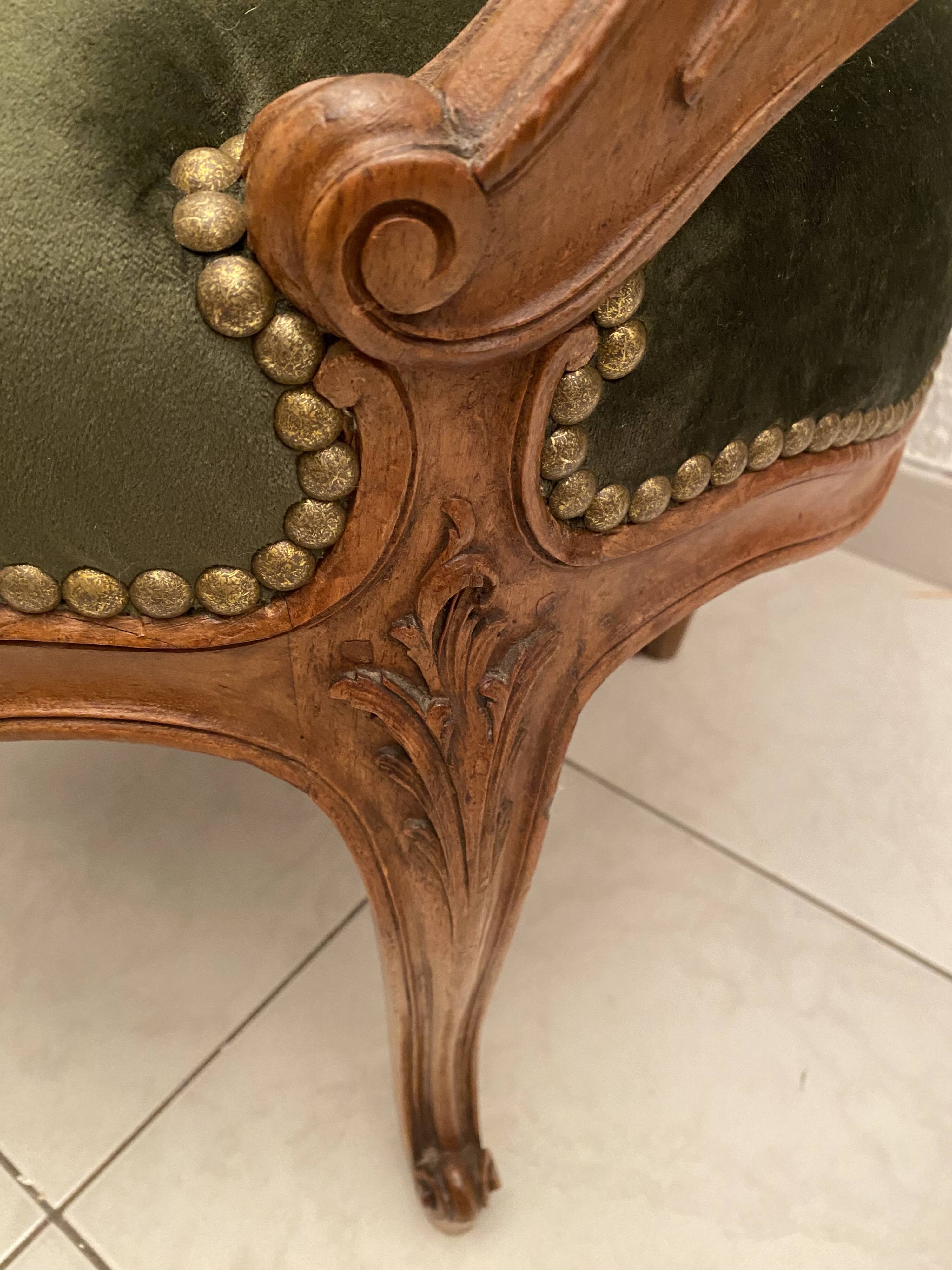 Paire de fauteuils en bois sculpté, XXème s.
