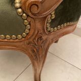 Paire de fauteuils en bois sculpté, XXème s.