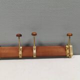 Danish teak and brass coat rack with adjustable hooks, 1960s.
