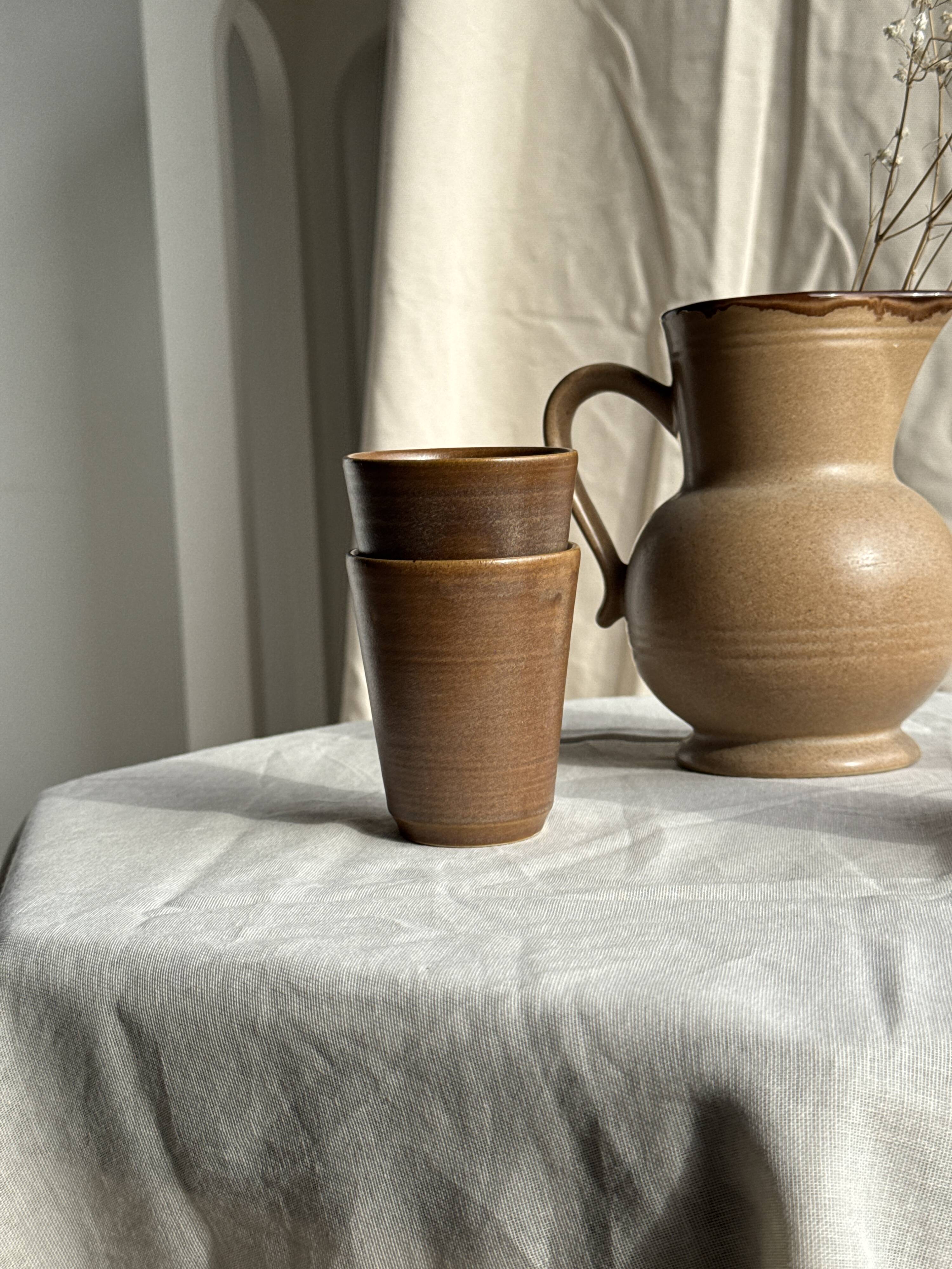 Set of 10 small stoneware mugs from Digoin.