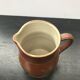 Former pitcher brown sandstone interior white 70s vintage