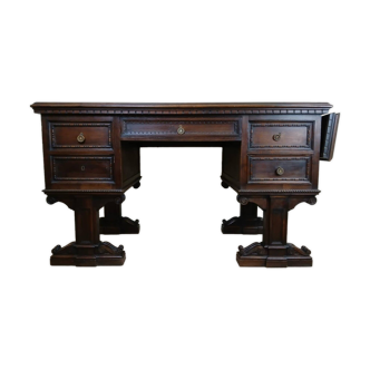 Unusual Renaissance style center desk made in the mid-19th century in walnut