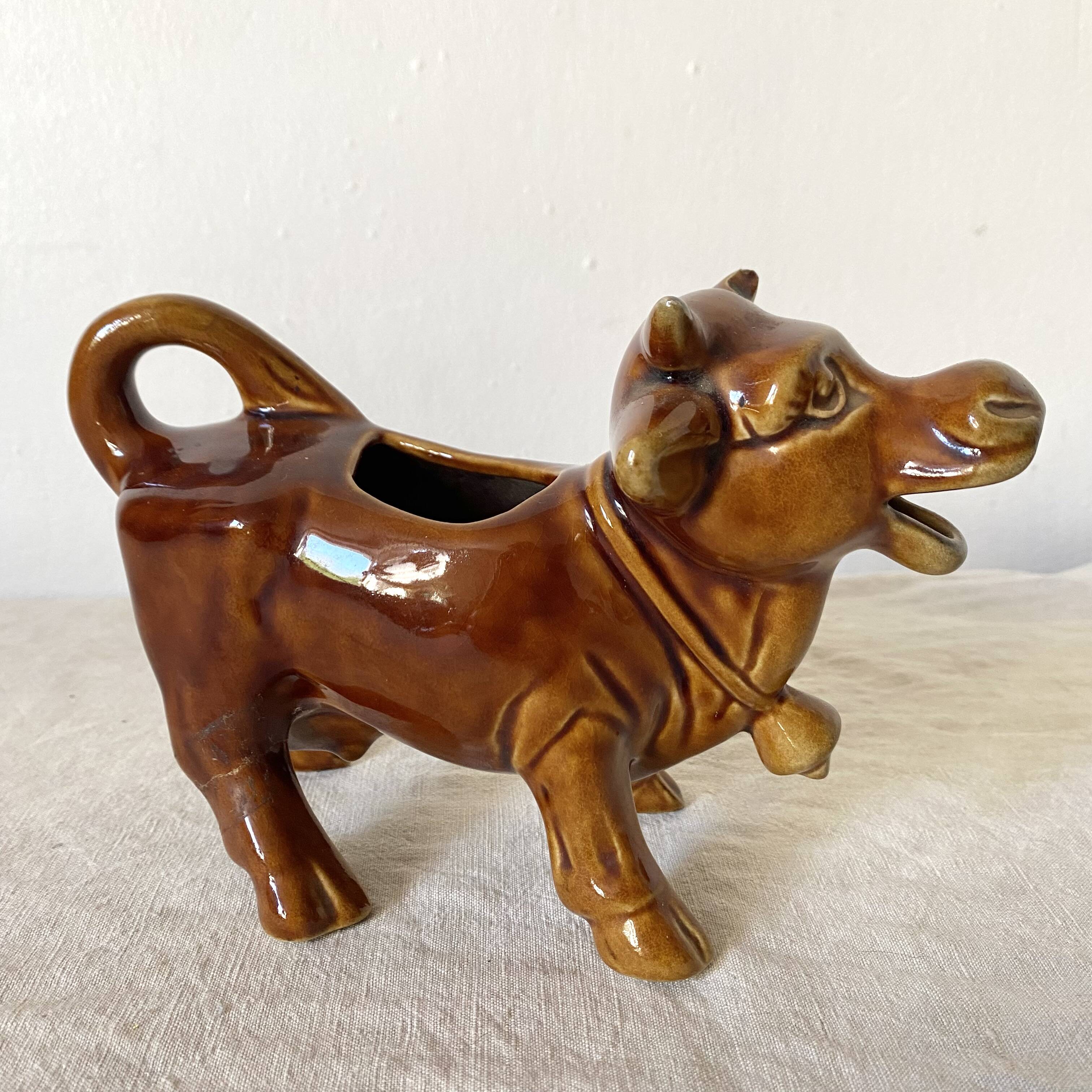 Creamer, zoomorphic cow milk jug Arthur Wood, England
