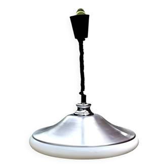 Space Age Design suspension rises and falls in brushed aluminum and plastic