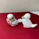 Pair of miniature white birds in ancient ceramics